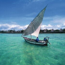 mozambique-dhow-sailing-blue-green-sea__large