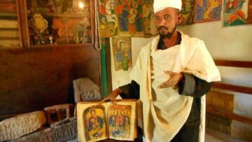 301383-learning-about-some-of-the-old-goatskin-books-and-artifacts-in-the-museum-at-yeha-axum-ethiopia-1