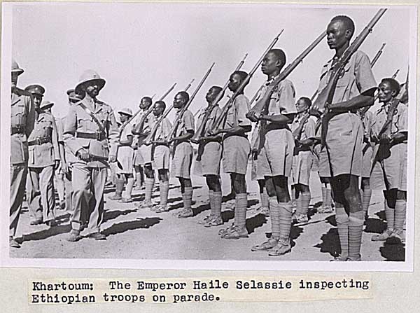 haile selassie inspects troops