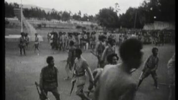Emperor of Ethiopia Haile Selassie inspects his troops upon his return from exile 26 June 1941
