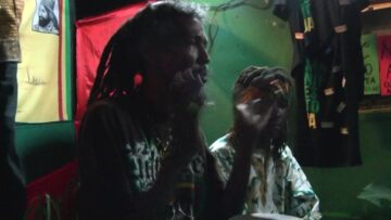 Jamaicas chanting Mau Mau warriors .